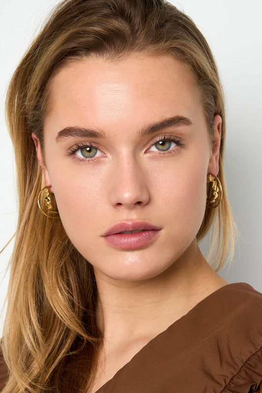 Pendientes de doble aro con giro