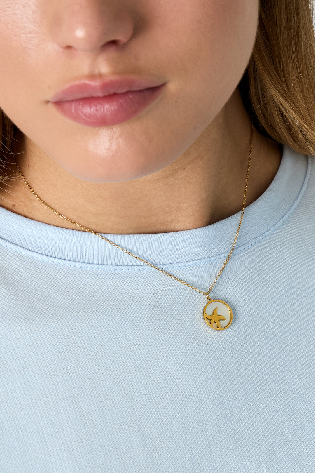 Collar con estrella de mar en círculo