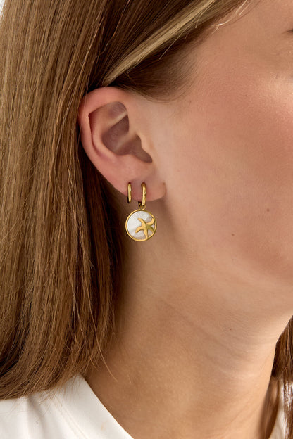 Pendientes con estrella de mar en círculo