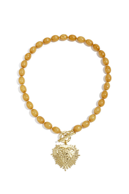 Collar de cuentas con dije de cierre frontal